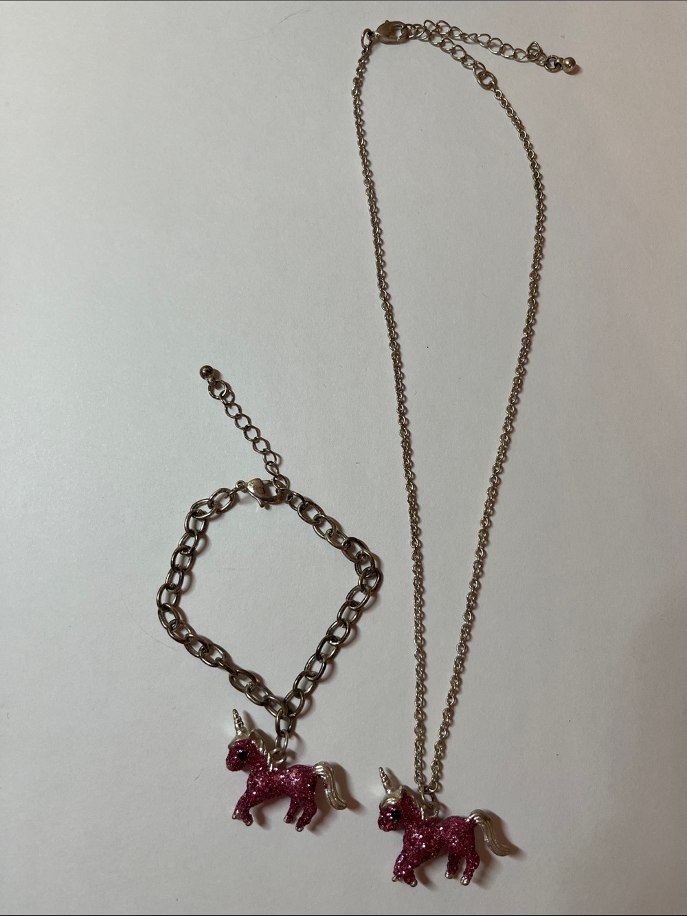 Pink sparkly unicorn bracelet and necklace set